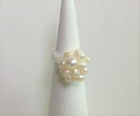 Locally hand made pearl ring. Cluster of White High Luster Fresh Water  Pearls / Band Made of White Pearl Colour Czech Glass Seed Beads / Strong and flexible Nylon Thread / Size 6. At Eclection Ottawa.