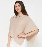 The Capri poncho offers year-round versatility in a top-quality knitted cotton mix that is soft against your skin. This is one of those essential pieces that serve as a year-round shoulder cover, inside or out and adds flair to your every outfit. Excellent travel garment. One size 18" short side Cropped. 64% Cotton/36% Rayon. Machine Wash Cold/Do Not Bleach. Tumble Dry Lo. Made in Canada. Light greige colour