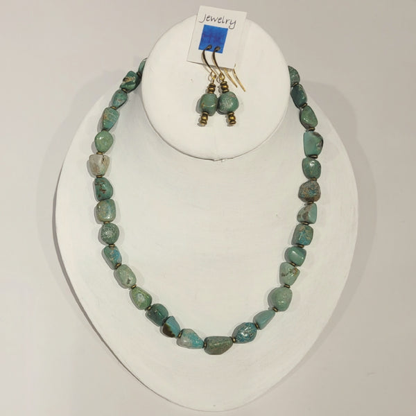 Single strand necklace of asymmetrical chunky turquoise and small round bronze beads and matching short drop earrings 