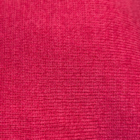 The Capri poncho offers year-round versatility in a top-quality knitted cotton mix that is soft against your skin. This is one of those essential pieces that serve as a year-round shoulder cover, inside or out and adds flair to your every outfit. Excellent travel garment. One size 18" short side Cropped. 64% Cotton/36% Rayon. Machine Wash Cold/Do Not Bleach. Tumble Dry Lo. Made in Canada. Lipstick pink