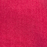 The Capri poncho offers year-round versatility in a top-quality knitted cotton mix that is soft against your skin. This is one of those essential pieces that serve as a year-round shoulder cover, inside or out and adds flair to your every outfit. Excellent travel garment. One size 18" short side Cropped. 64% Cotton/36% Rayon. Machine Wash Cold/Do Not Bleach. Tumble Dry Lo. Made in Canada. Lipstick pink