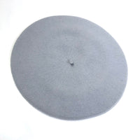 The Basque Beret has the most classic shape and is made of 100% felted wool and finished with rolled edging. Calm Gray - Light/medium blue-grey