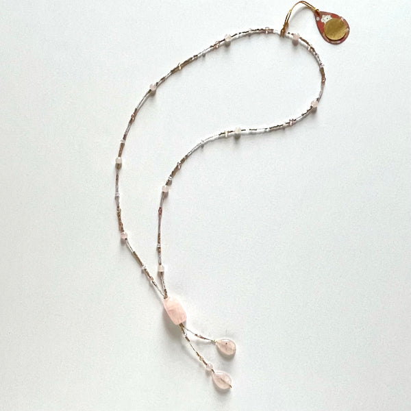 Find this handmade necklace by local artisan Khalia Scott at Eclection Ottawa. This necklace has a mix of large and smaller polished rose quartz beads, Czech crystal beads and glass seed beads and it is finished off with an elegant twin dangle crafted in matching materials. It measures approximately 28" in length (plenty long to go over your head) with an additional 4" of dangle.