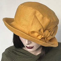 Fanfreluche "Over the Topper" Hat in Yellow Gold Linen with Big Bow Trim