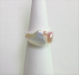 Locally hand made pearl ring.Cluster of one 12X10mm White Keshi Fresh Water  Pearl and Two Small Pink Fresh Water  Pearls / Band made of White Pearl Colour Czech Seed Beads / Strong and flexible Nylon Thread / Size 6.5. at Eclection Ottawa.