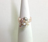 Locally hand made pearl ring. Cluster of Pinks / Light Pinks / Light Greys / White High Luste Fresh Water  Pearls / Band made of Light Pink Crystal Coloured Czech Glass Seed Beads / Strong and flexible Nylon Thread / Size 8. at Eclection Ottawa.