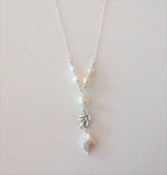 Pearls and Chain Necklace by Gaby. Central 12x13mm Keshi Fresh Water Pearl with 5 White High Luster Fresh Water Pearls / Dainty Silver Sterling Chain and Clasp / Silver Plated Leaf Connecor / 18"