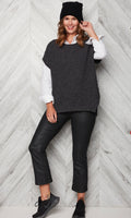 This relaxed-fit vest is simple, flattering, stylish and a very versatile piece.  Layer with a blouse, turtleneck, or long-sleeved t-shirt for either outerwear chic or indoor coziness or try it on its own in warmer weather. The Abbey's clean, loose, body following cut pairs well with jeans or leggings, and short boots or sneakers. Add to that, a supple yet substantial weight and drape, with a classic nubby knit pattern and you've got your next go-to piece. 