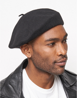 The Basque Beret has the most classic shape and is made of 100% felted wool and finished with rolled edging. Black