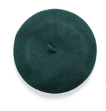 The Basque Beret has the most classic shape and is made of 100% felted wool and finished with rolled edging. Tartan Green - Deep forest green with a hint of blue