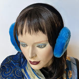 Eclection Ottawa gives you Canadian-made 100% sheepskin earmuffs in 11 bright and neutral colours. These soft and fun sheepskin earmuffs have lots of nice, warm, coverage and are also fully lined with short sheepskin on the inside to keep you warm and toasty. They feature a new suede-covered headband that you can wear as is or turned at 90 degrees for smaller-headed folks. Bright medium blue short haired sheepskin. Black headband