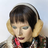 Eclection Ottawa gives you Canadian-made 100% sheepskin earmuffs in 11 bright and neutral colours. These soft and fun sheepskin earmuffs have lots of nice, warm, coverage and are also fully lined with short sheepskin on the inside to keep you warm and toasty. They feature a new suede-covered headband that you can wear as is or turned at 90 degrees for smaller-headed folks. Honey beige short haired sheepskin. Soft White headband