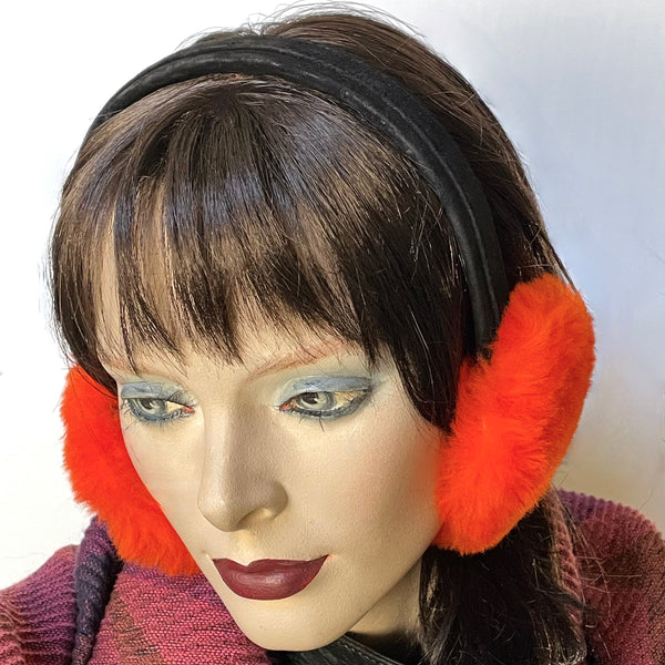 Eclection Ottawa gives you Canadian-made 100% sheepskin earmuffs in 11 bright and neutral colours. These soft and fun sheepskin earmuffs have lots of nice, warm, coverage and are also fully lined with short sheepskin on the inside to keep you warm and toasty. They feature a new suede-covered headband that you can wear as is or turned at 90 degrees for smaller-headed folks. Bright orange short haired sheepskin. black headband
