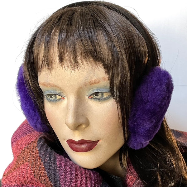 Eclection Ottawa gives you Canadian-made 100% sheepskin earmuffs in 11 bright and neutral colours. These soft and fun sheepskin earmuffs have lots of nice, warm, coverage and are also fully lined with short sheepskin on the inside to keep you warm and toasty. They feature a new suede-covered headband that you can wear as is or turned at 90 degrees for smaller-headed folks. Purple short haired sheepskin. Black headband