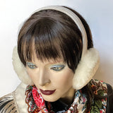 Eclection Ottawa gives you Canadian-made 100% sheepskin earmuffs in 11 bright and neutral colours. These soft and fun sheepskin earmuffs have lots of nice, warm, coverage and are also fully lined with short sheepskin on the inside to keep you warm and toasty. They feature a new suede-covered headband that you can wear as is or turned at 90 degrees for smaller-headed folks. Soft white short haired sheepskin. Off-white headband